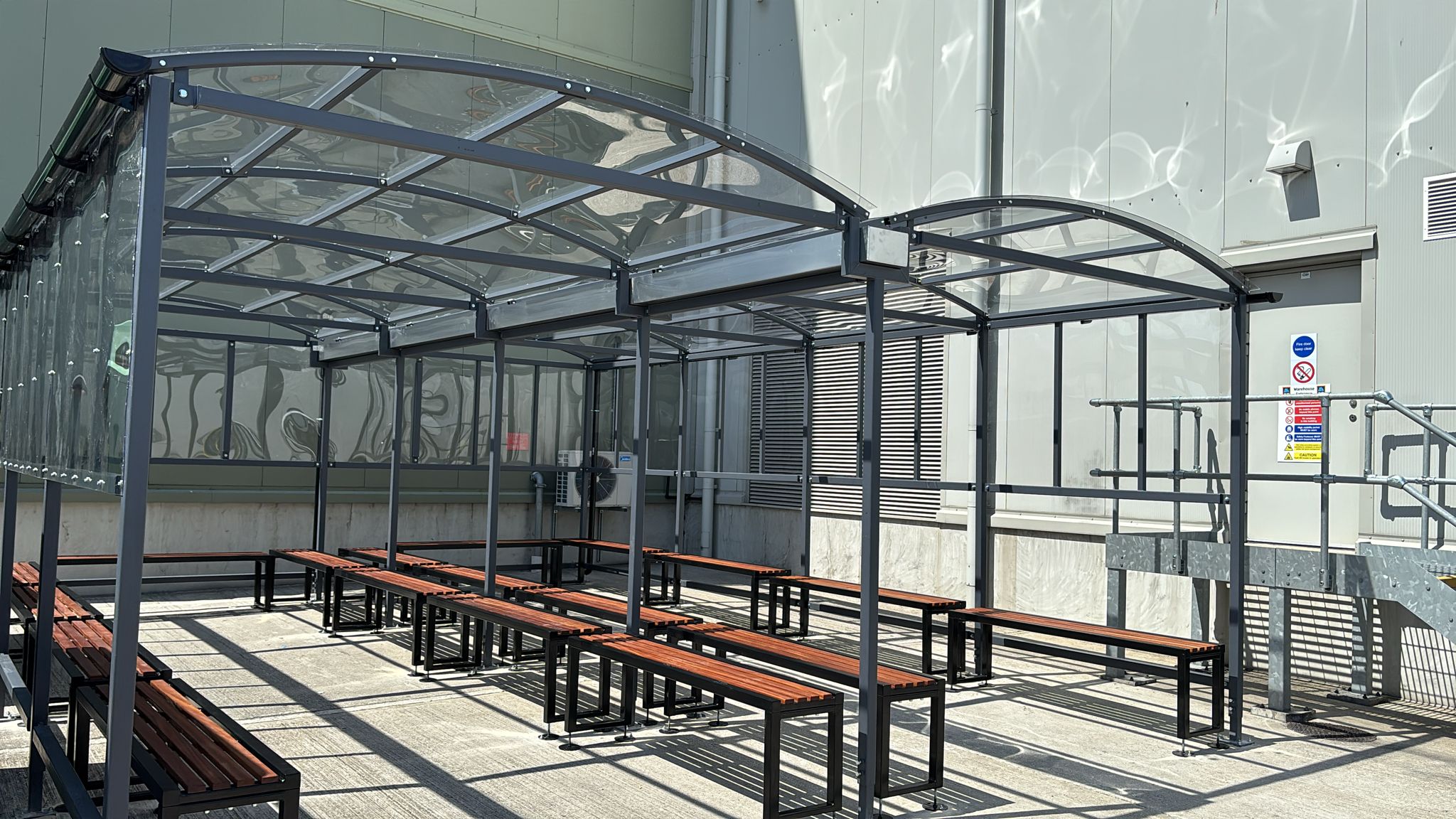 Steel canopy shelter with seating fabricated by D&R Fabrications